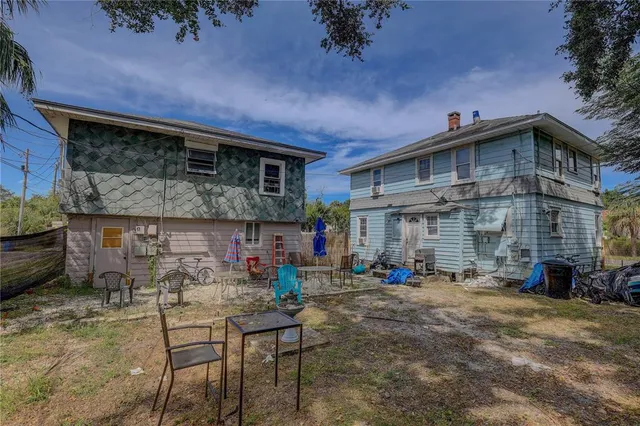 a view of open kitchen with seating area
