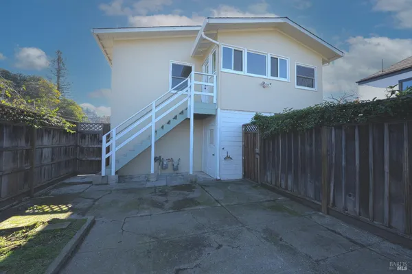 a view of backyard of house