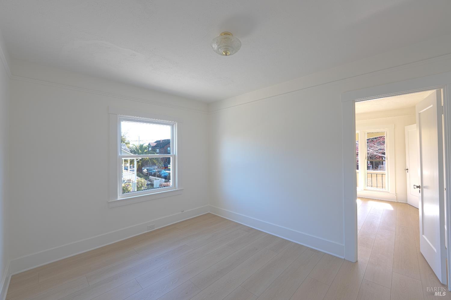 20 Taylor Street San Rafael, CA 94901 - Photo 9 of 22 an empty room with windows