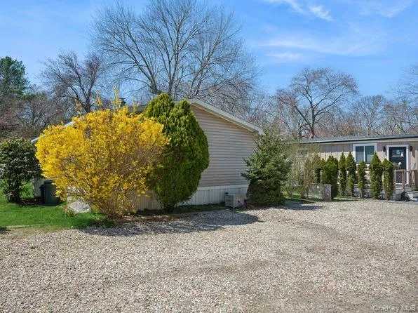 a view of a backyard of the house