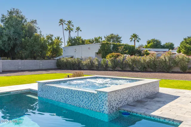 a front view of house with yard and seating area