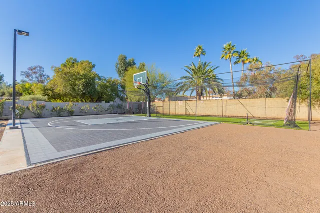 a view of a swimming pool with an outdoor space and seating area
