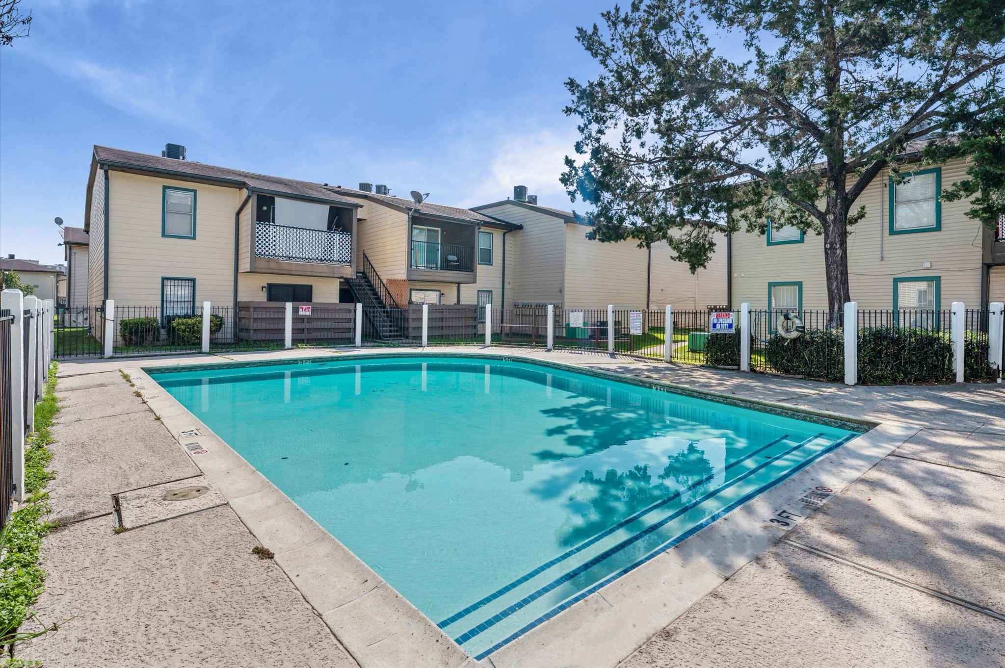 a view of a house with swimming pool