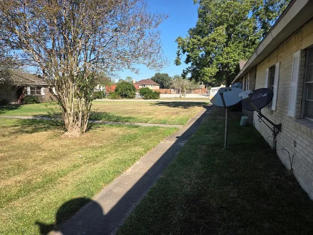 a view of swimming pool with an outdoor seating