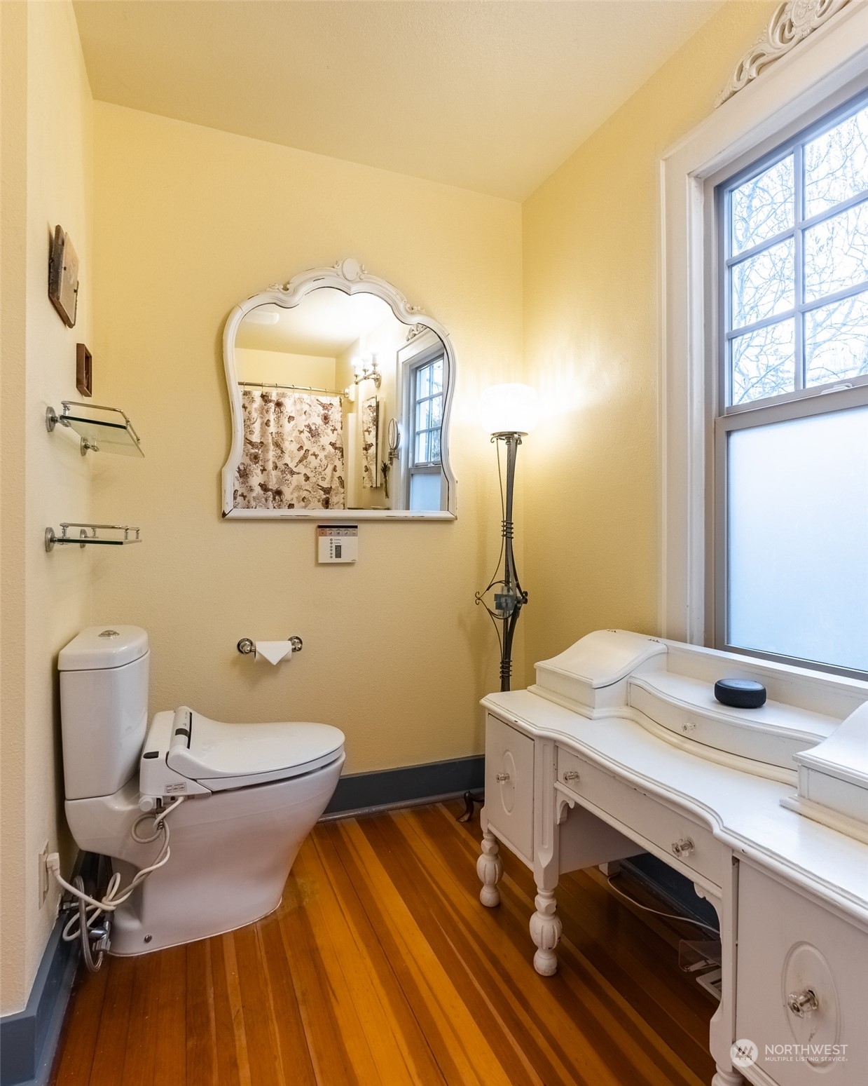 2212 Broadway Bellingham, WA 98225 - Photo 12 of 40 a bathroom with a sink and a mirror