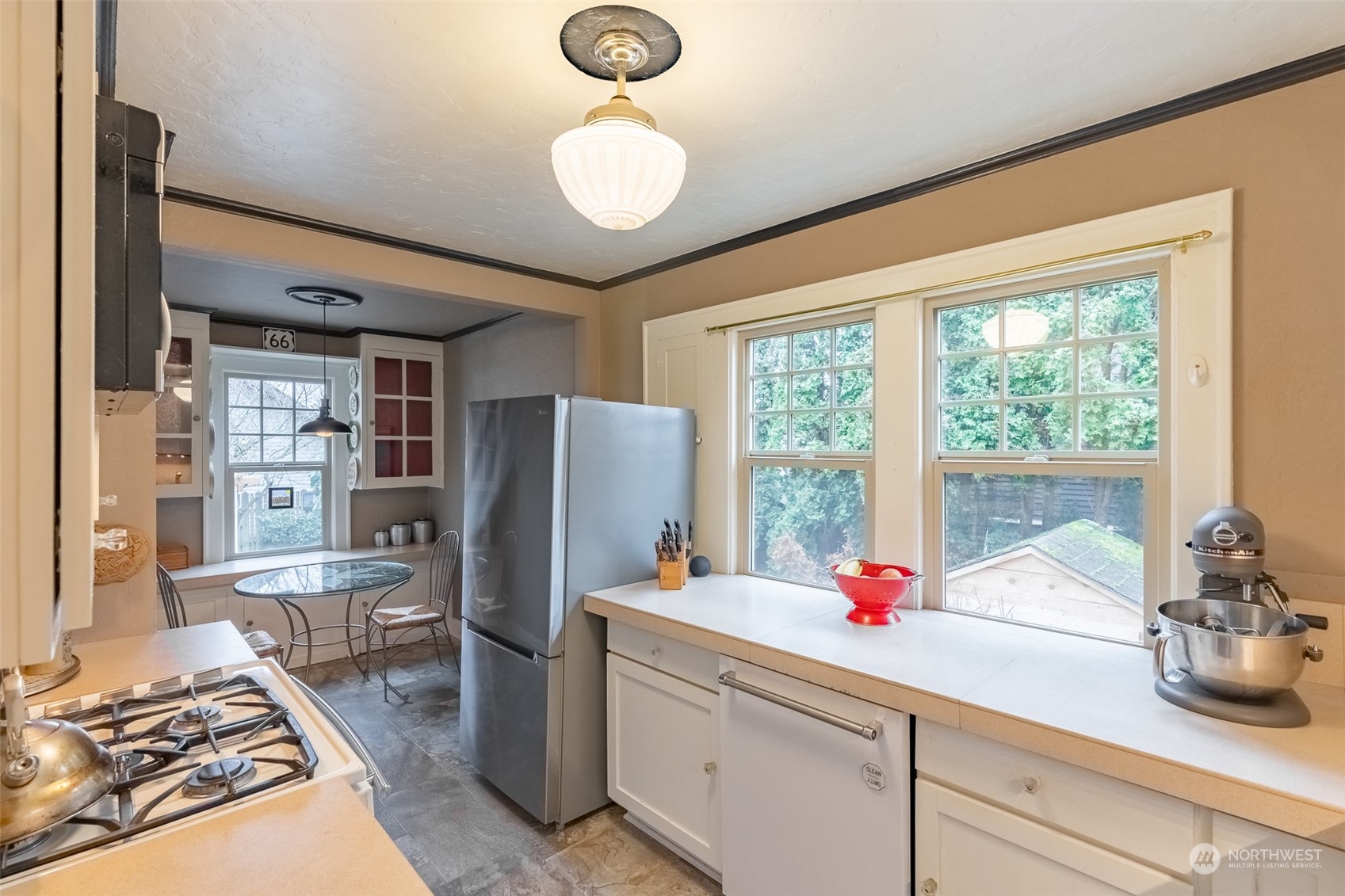 2212 Broadway Bellingham, WA 98225 - Photo 17 of 40 a kitchen with sink refrigerator and window