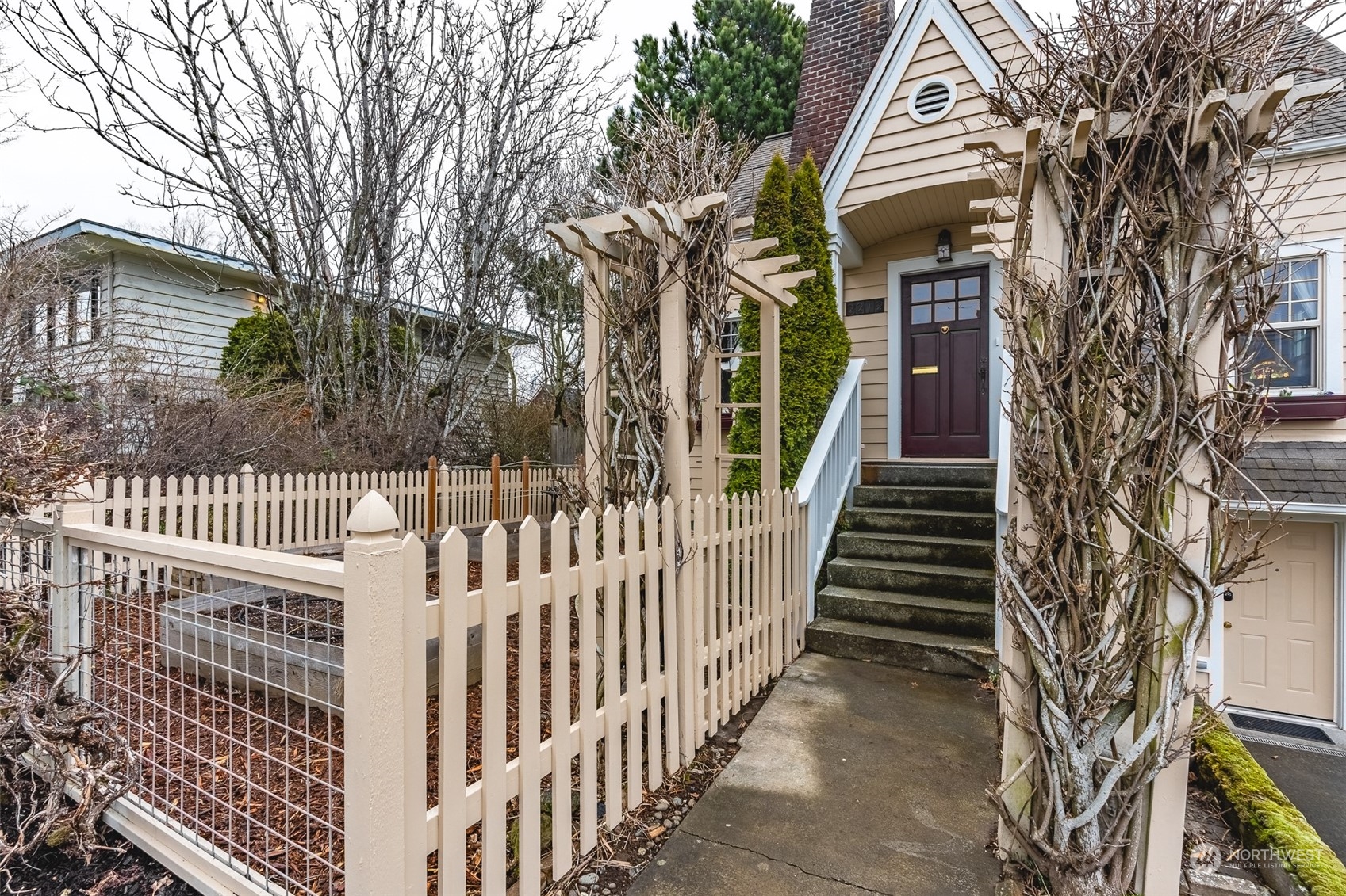 2212 Broadway Bellingham, WA 98225 - Photo 2 of 40 a view of a house with iron fence