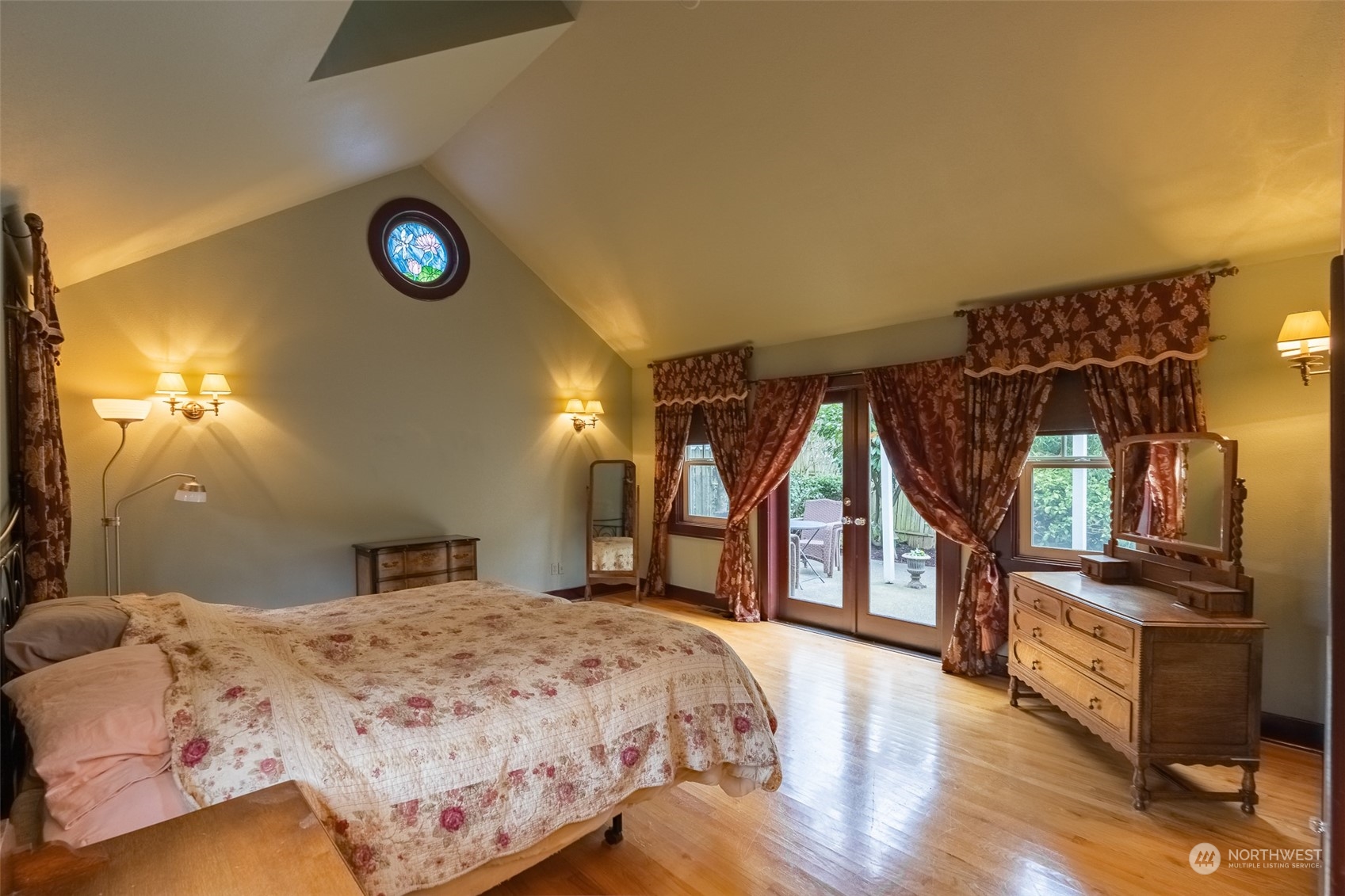 2212 Broadway Bellingham, WA 98225 - Photo 23 of 40 a bedroom with a bed next to a window