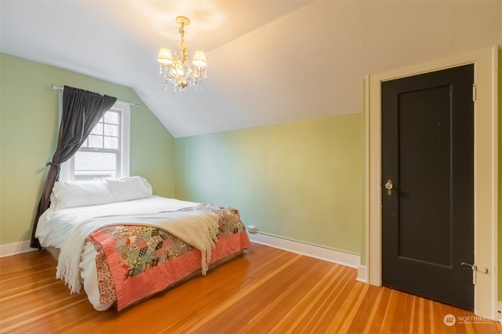 2212 Broadway Bellingham, WA 98225 - Photo 27 of 40 a bedroom with a bed and a window