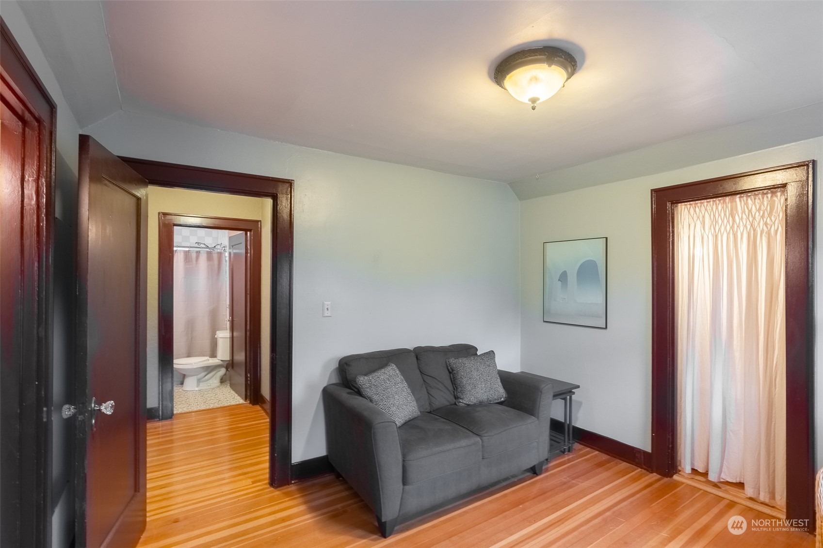 2212 Broadway Bellingham, WA 98225 - Photo 30 of 40 a living room with furniture and a wooden floor