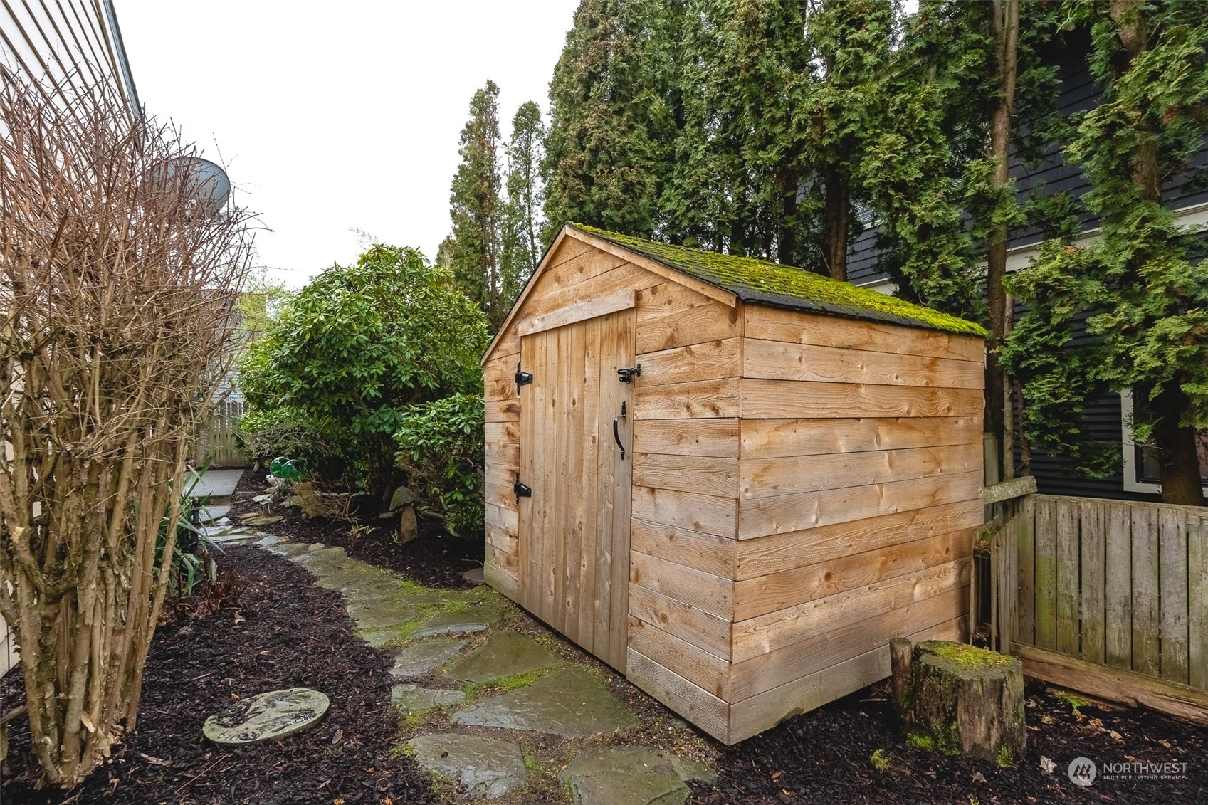 2212 Broadway Bellingham, WA 98225 - Photo 35 of 40 a view of a small house with wooden fence