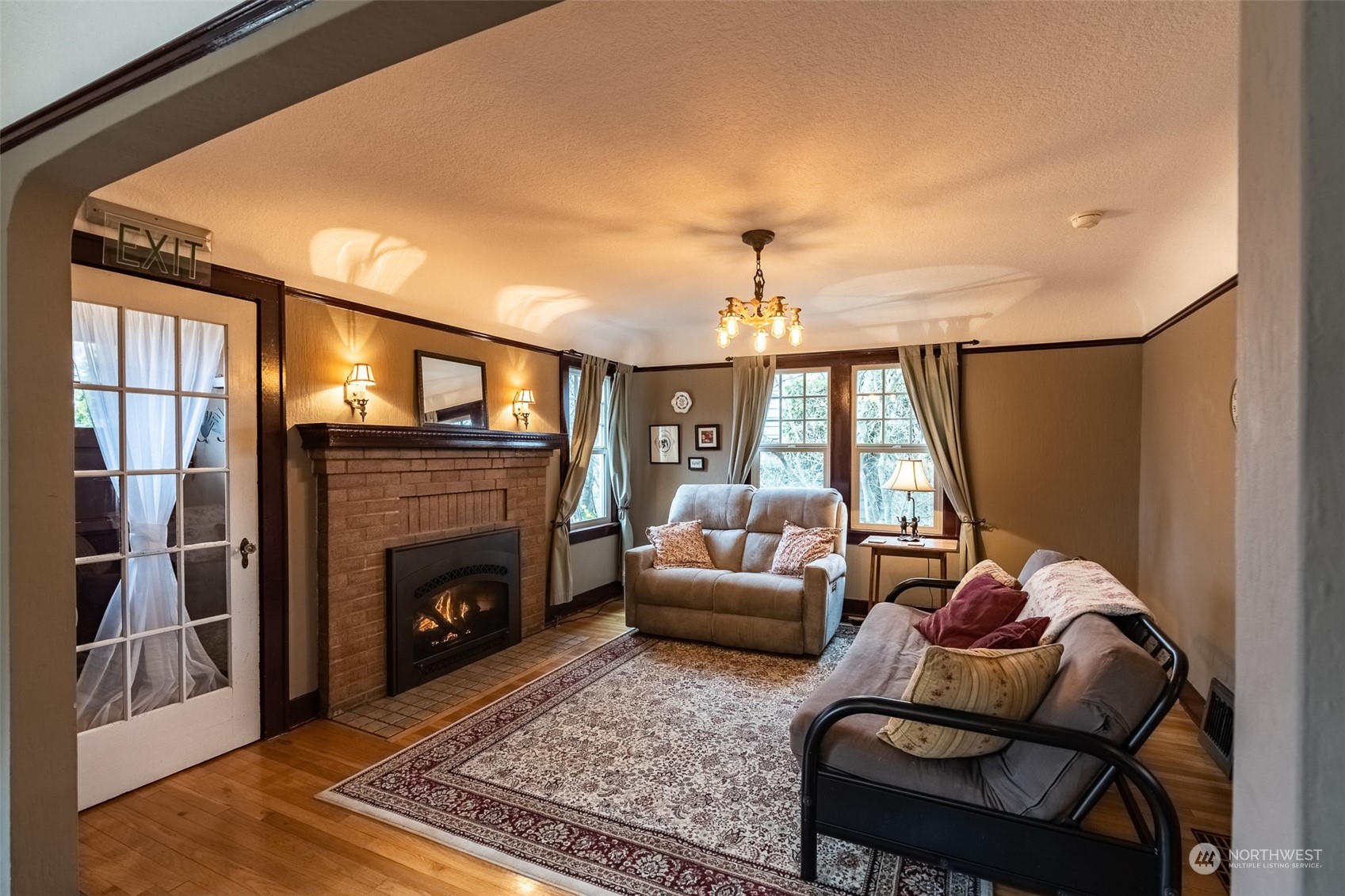 2212 Broadway Bellingham, WA 98225 - Photo 5 of 40 a living room with furniture and a fireplace