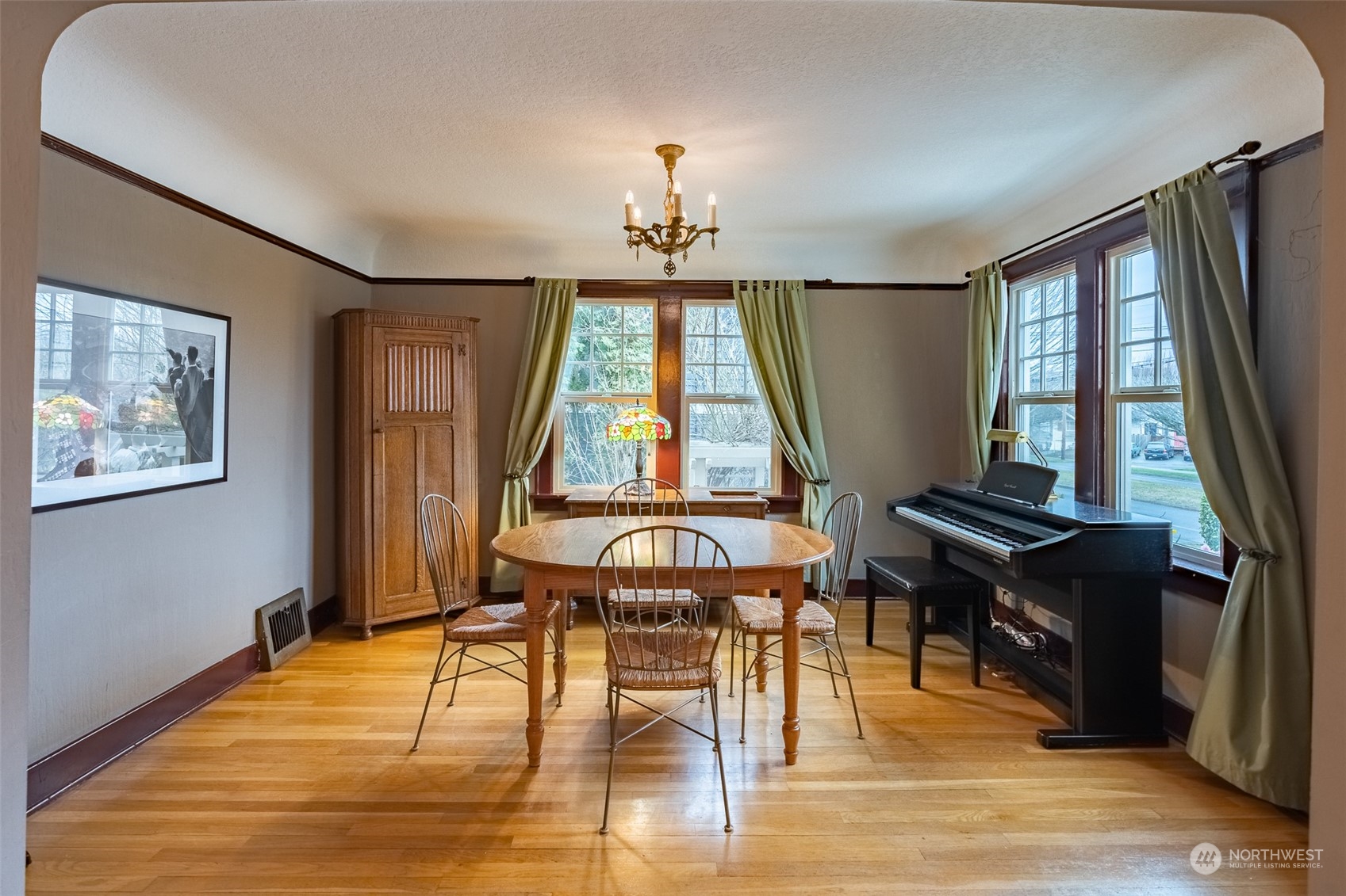 2212 Broadway Bellingham, WA 98225 - Photo 9 of 40 a view of a dining room with furniture window and wooden floor