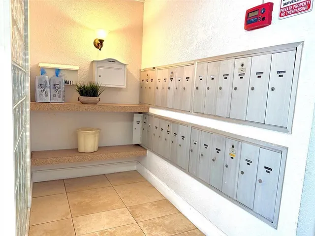 a bathroom with a double vanity sink and mirror