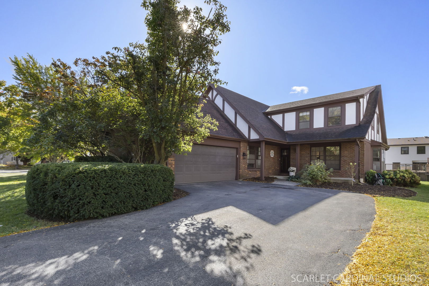 625 Edward Road Naperville, IL 60540 - Photo 1 of 1 a front view of a building with a yard