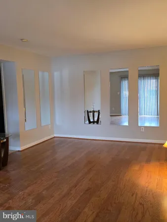 a bathroom with a bath tub with a shower