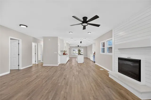 a view of a balcony with wooden floor