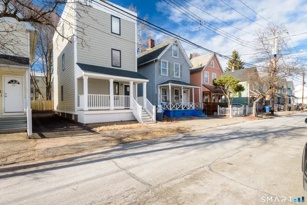 a view of a building with a street