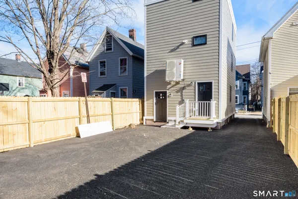 a view of a house with a street
