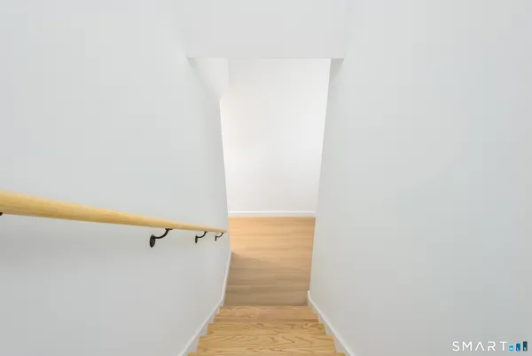 a view of hallway with stairs