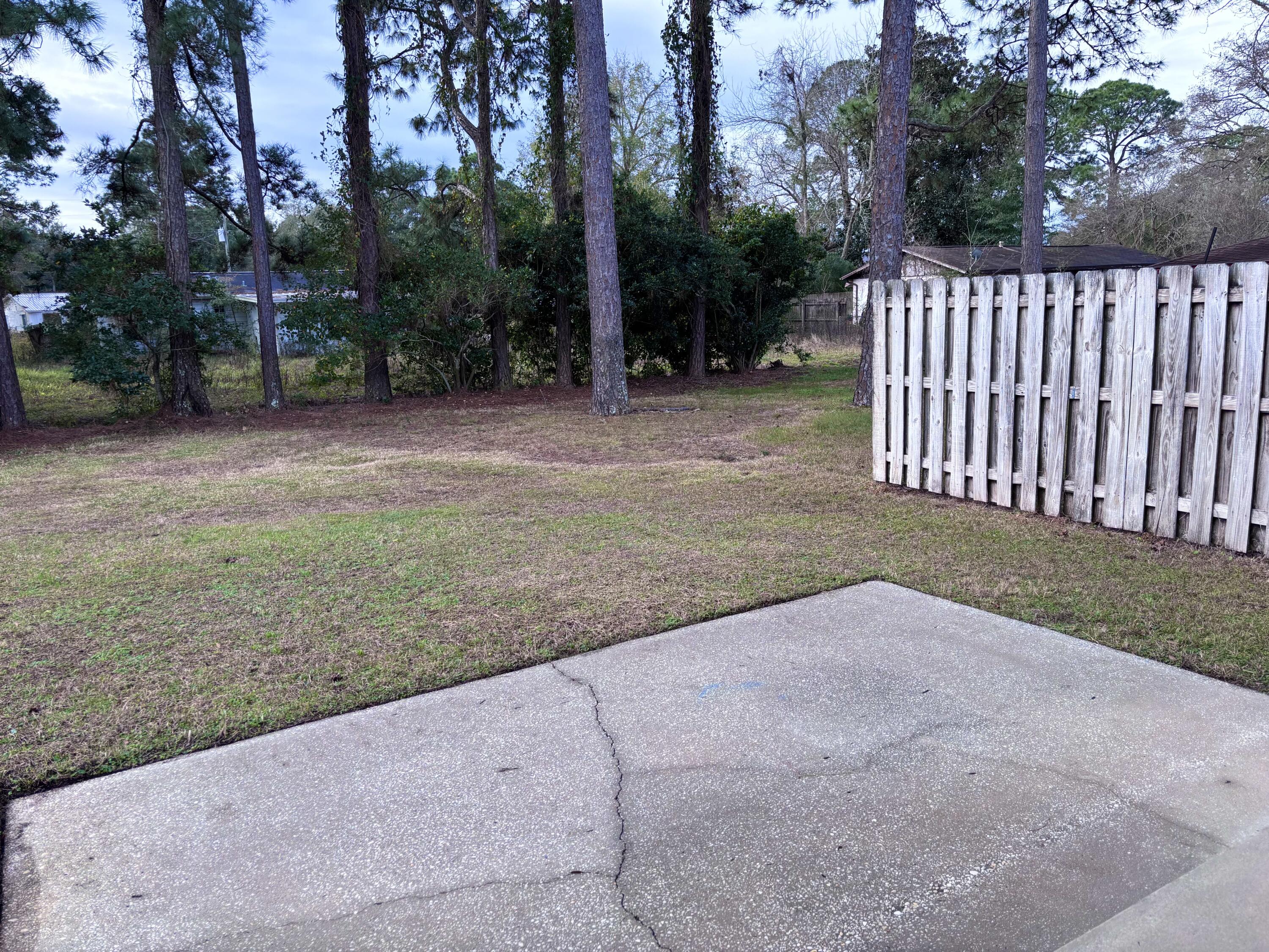 64 7th Street Shalimar, FL 32579 - Photo 14 of 16 a view of backyard with green space