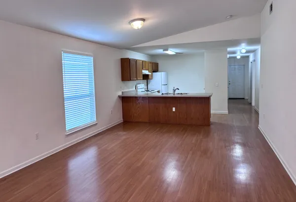 a view of kitchen and natural light