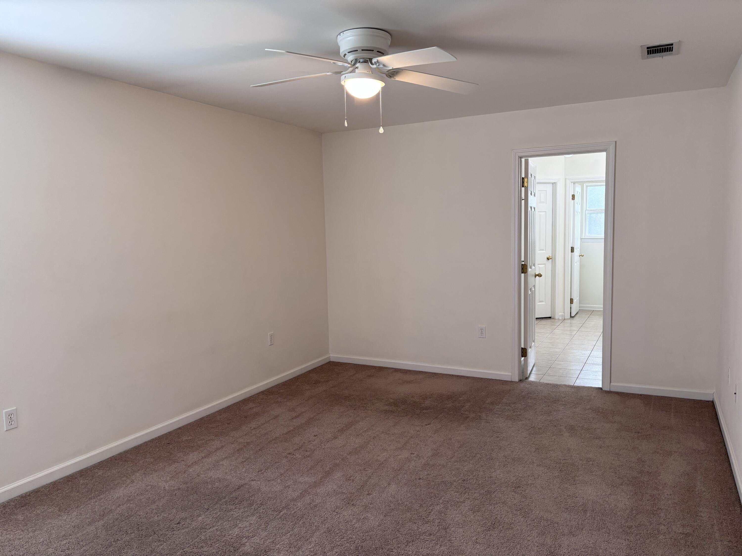 64 7th Street Shalimar, FL 32579 - Photo 7 of 16 a view of an empty room