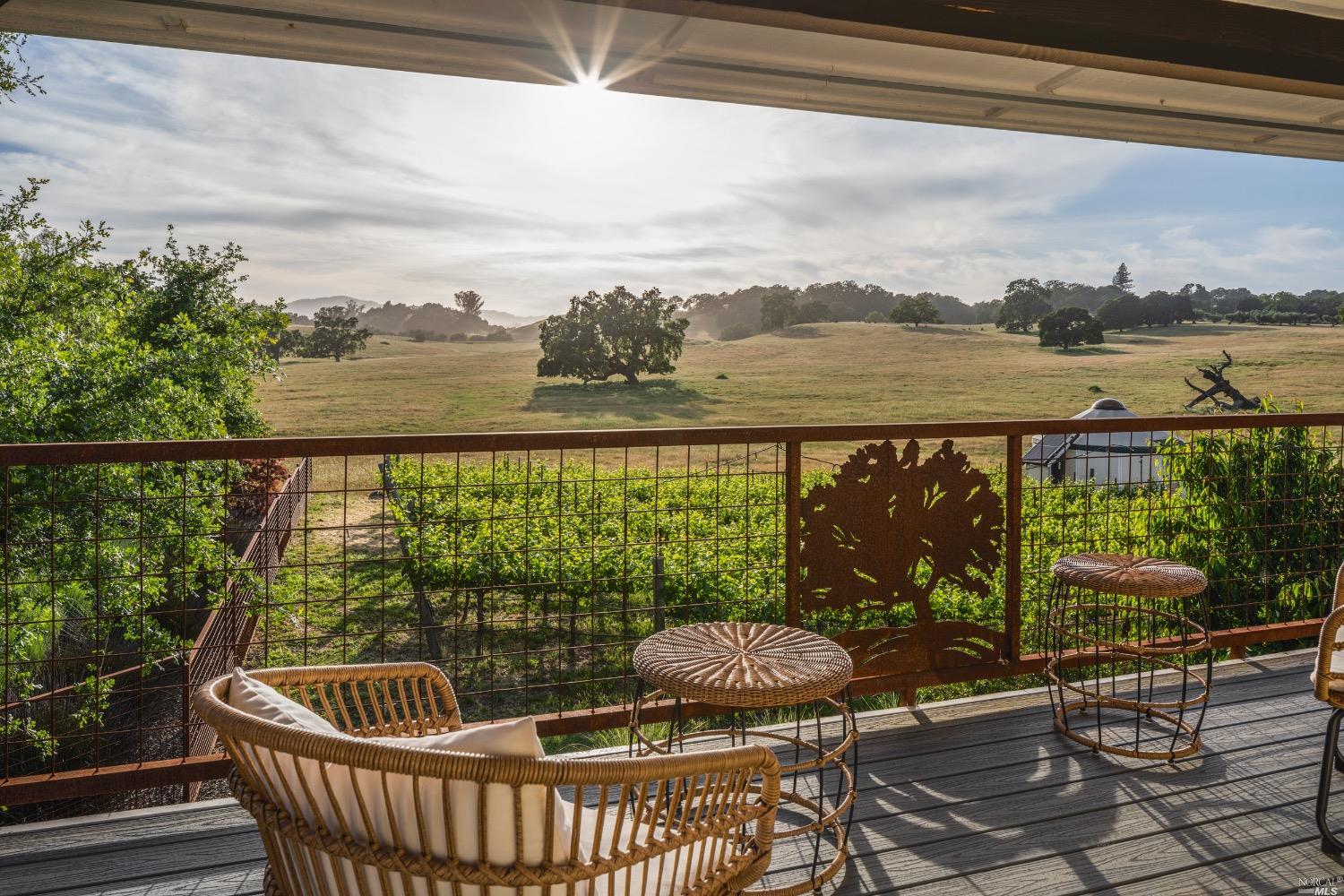 a view of roof deck with furniture