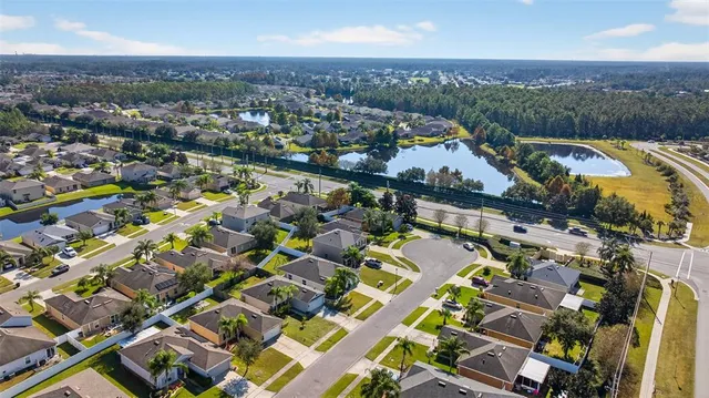 an aerial view of a city with lots of residential buildings