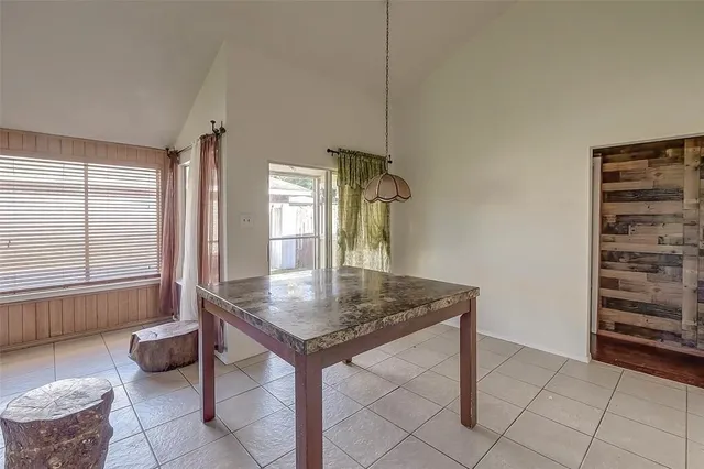 a view of kitchen island with furniture and window