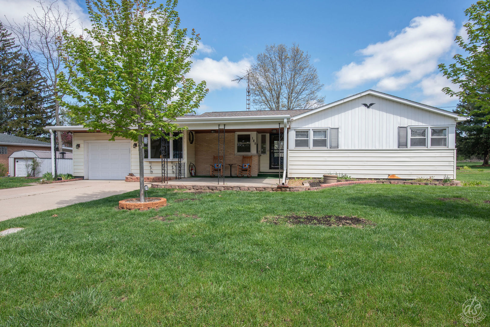 185 Swanson Road Sycamore, IL 60178 - Photo 1 of 47 a front view of house with yard and green space