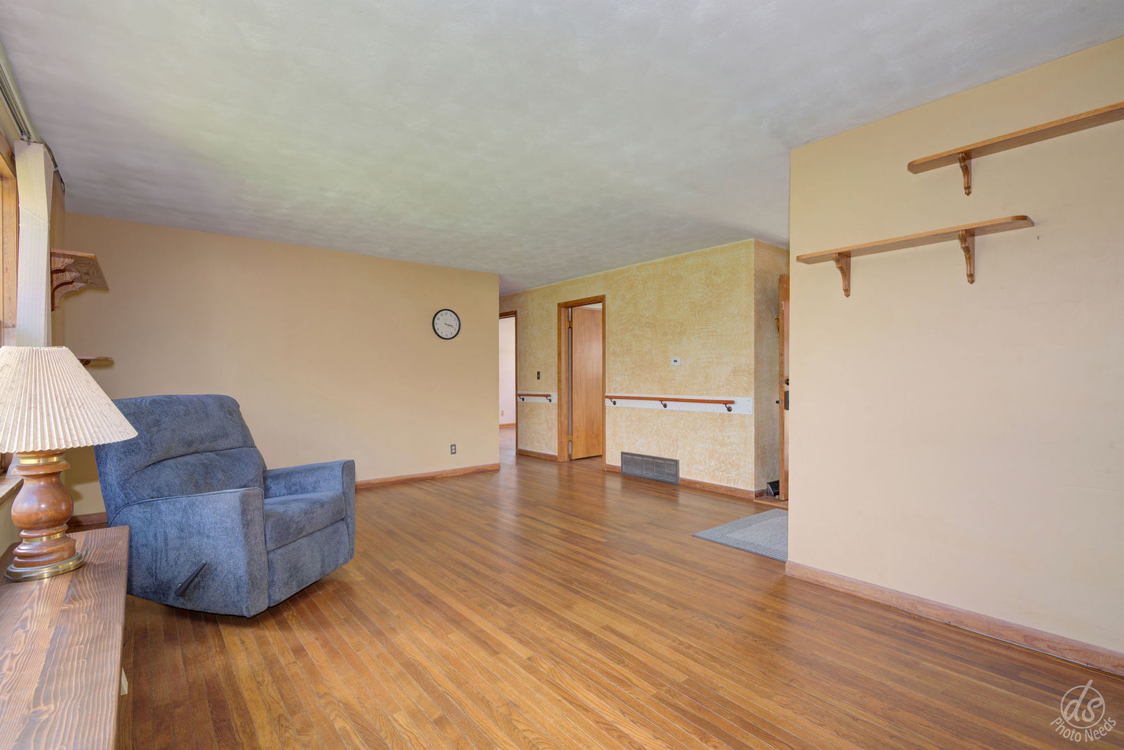 185 Swanson Road Sycamore, IL 60178 - Photo 14 of 47 a view of an empty room with wooden floor and a window