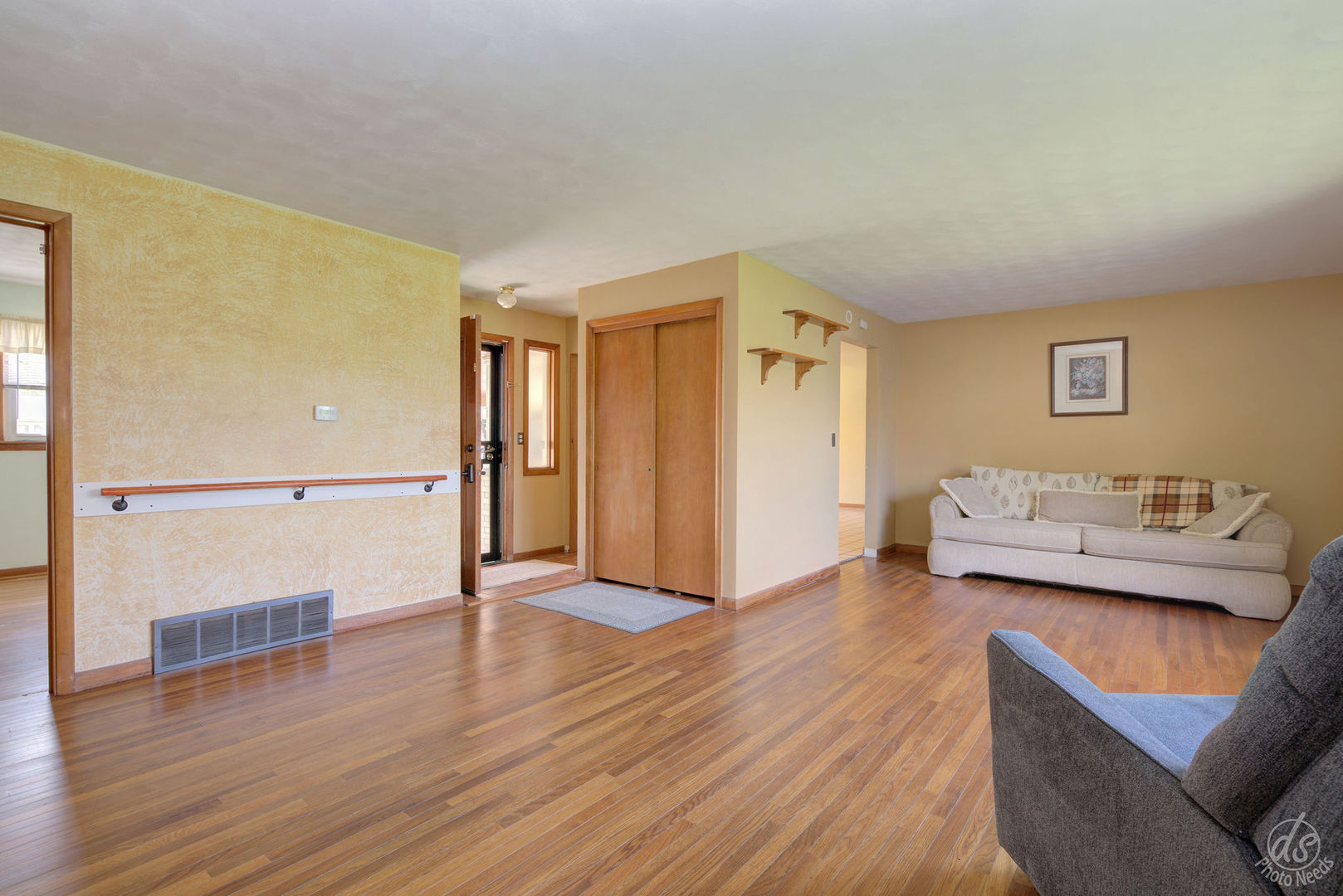 185 Swanson Road Sycamore, IL 60178 - Photo 16 of 47 a view of a livingroom with furniture and wooden floor