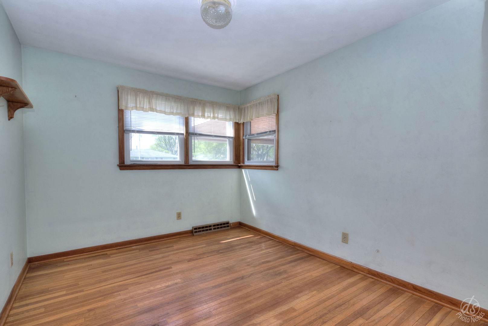 185 Swanson Road Sycamore, IL 60178 - Photo 21 of 47 an empty room with wooden floor and windows