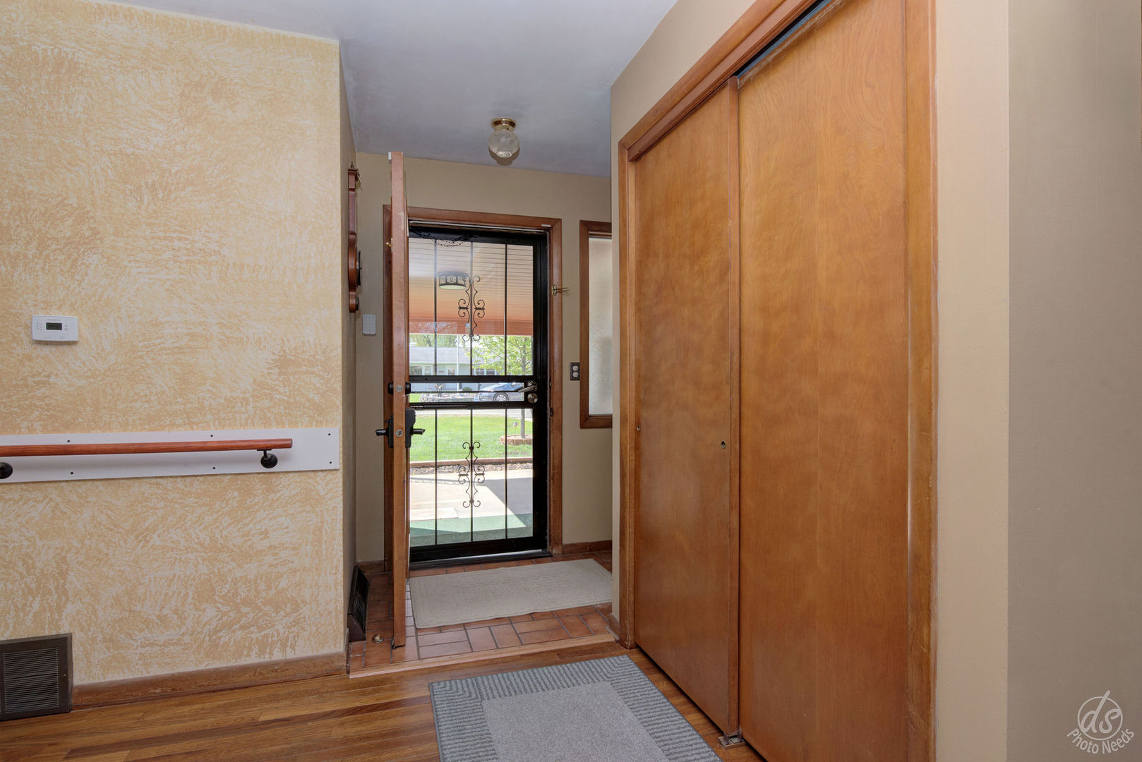 185 Swanson Road Sycamore, IL 60178 - Photo 8 of 47 a view of front door with wooden floor