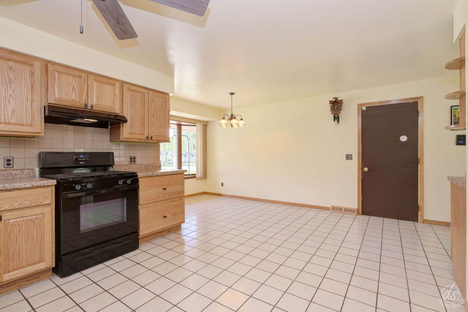 185 Swanson Road Sycamore, IL 60178 - Photo 10 of 47 a kitchen with stainless steel appliances granite countertop a stove a sink and a refrigerator