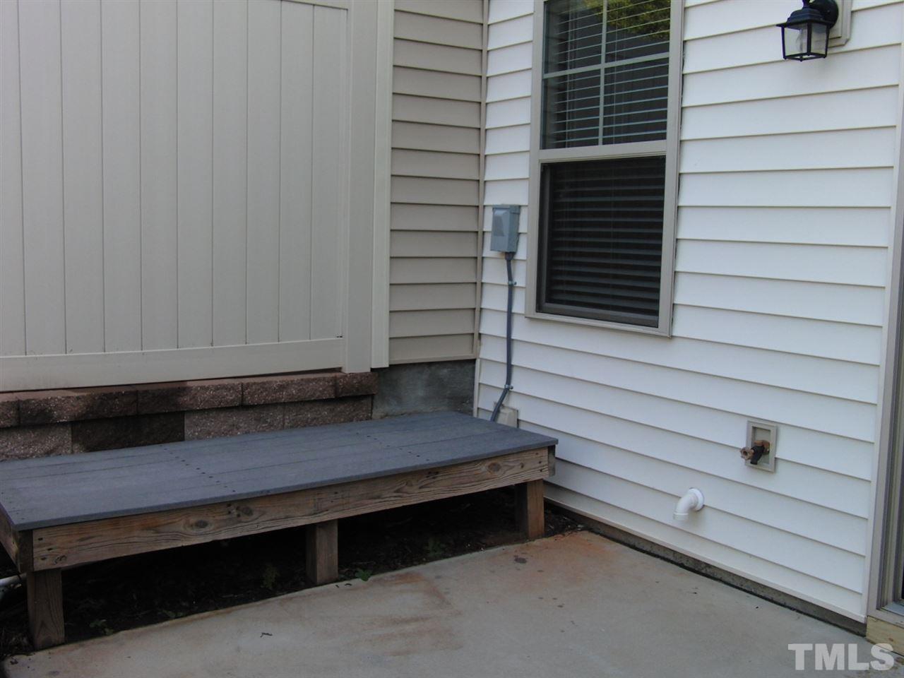 7893 Allscott Way Raleigh, NC 27612 - Photo 23 of 25 a view of backyard and utility area