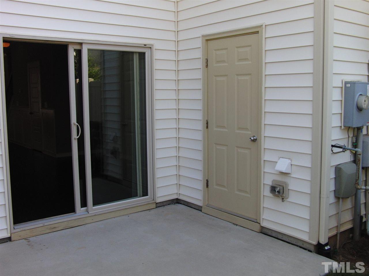 7893 Allscott Way Raleigh, NC 27612 - Photo 24 of 25 a view of an empty room to rooms