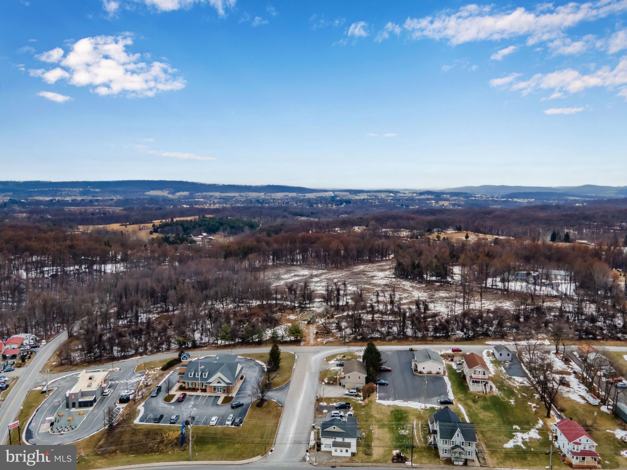 Pine Road Etters, PA 17319 - Photo 18 of 24 an aerial view of a house with a swimming pool yard and mountain view in back