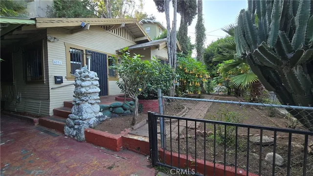 a balcony with lots of trees in the background