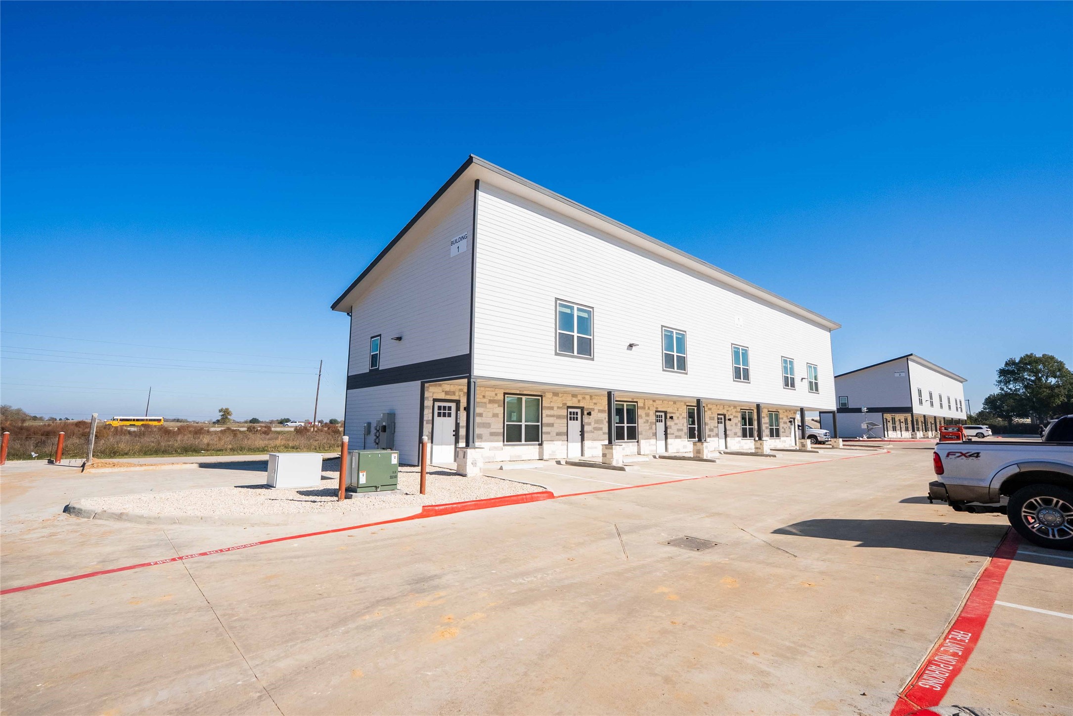 2101 Reinke Road, Unit 3202 Waller, TX 77484 - Photo 21 of 24 a view of a street with cars