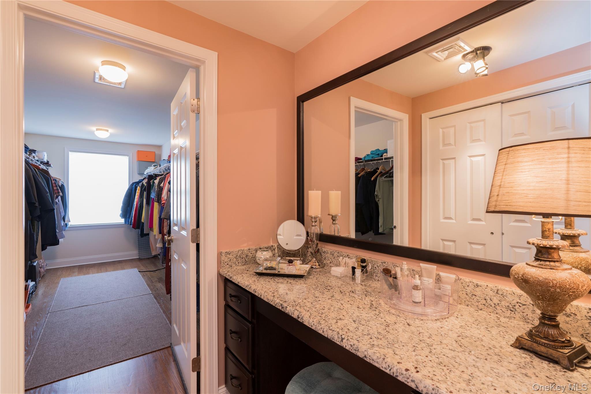78 Moore Road Hopewell Junction, NY 12533 - Photo 25 of 38 Full bathroom with light wood-style flooring, vanity, and a spacious closet
