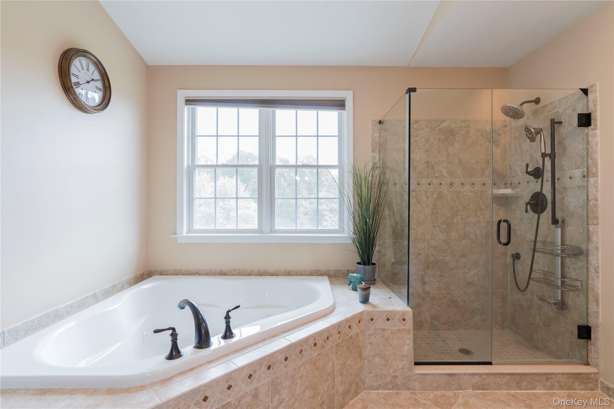 78 Moore Road Hopewell Junction, NY 12533 - Photo 27 of 38 Full bathroom with a shower stall and a bath