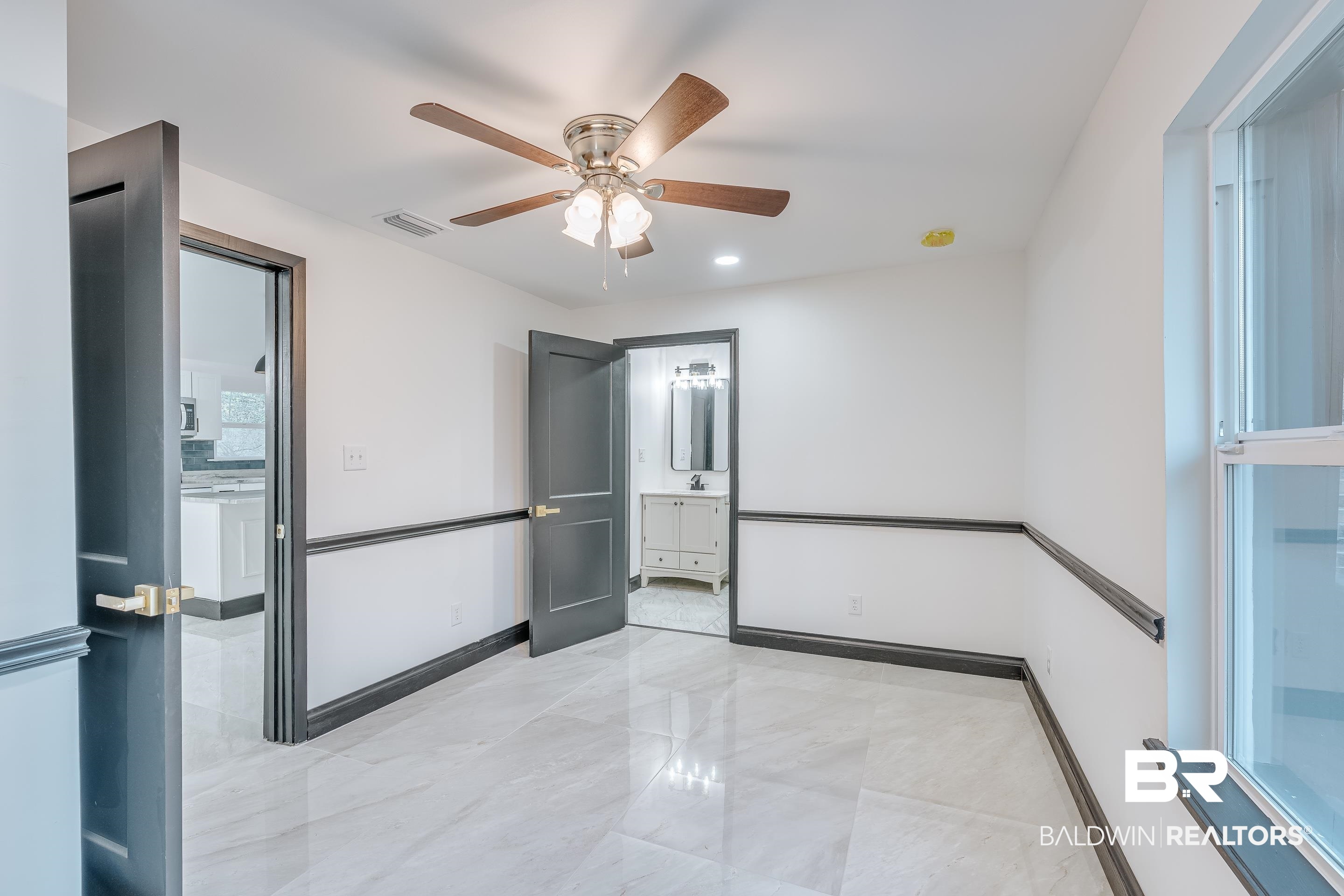 1190 Military Road Mount Vernon, AL 36560 - Photo 19 of 47 Unfurnished room featuring light marble finish flooring, ceiling fan, and recessed lighting