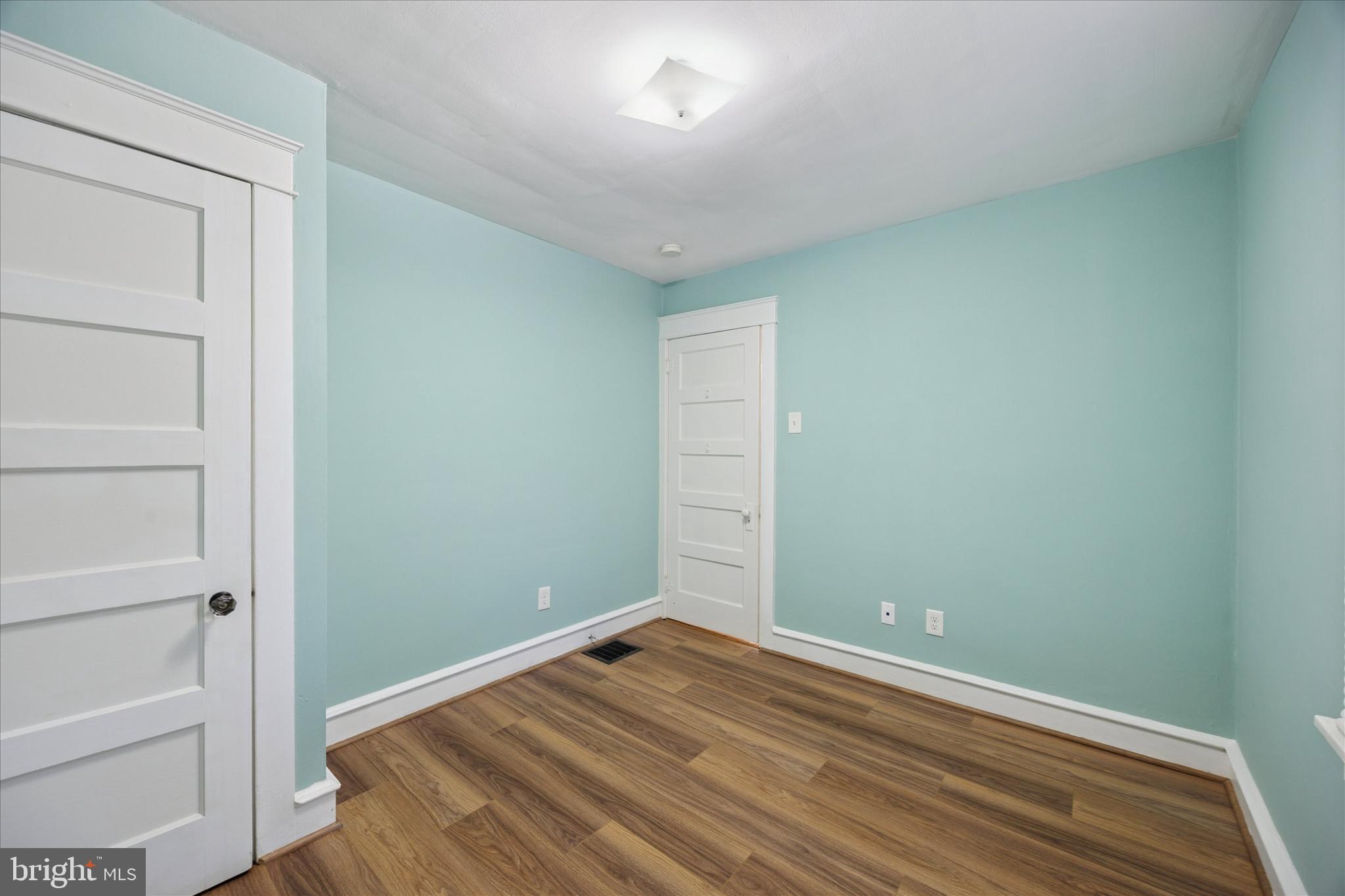 1035 Langley Street Trainer, PA 19061 - Photo 11 of 16 a view of room with wooden floor