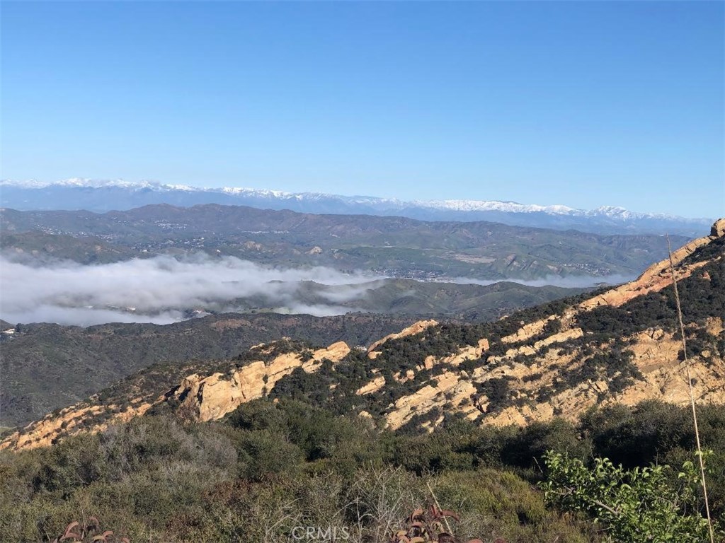 24575 Piuma Road Malibu, CA 90265 - Photo 2 of 5 a view of lake with mountain
