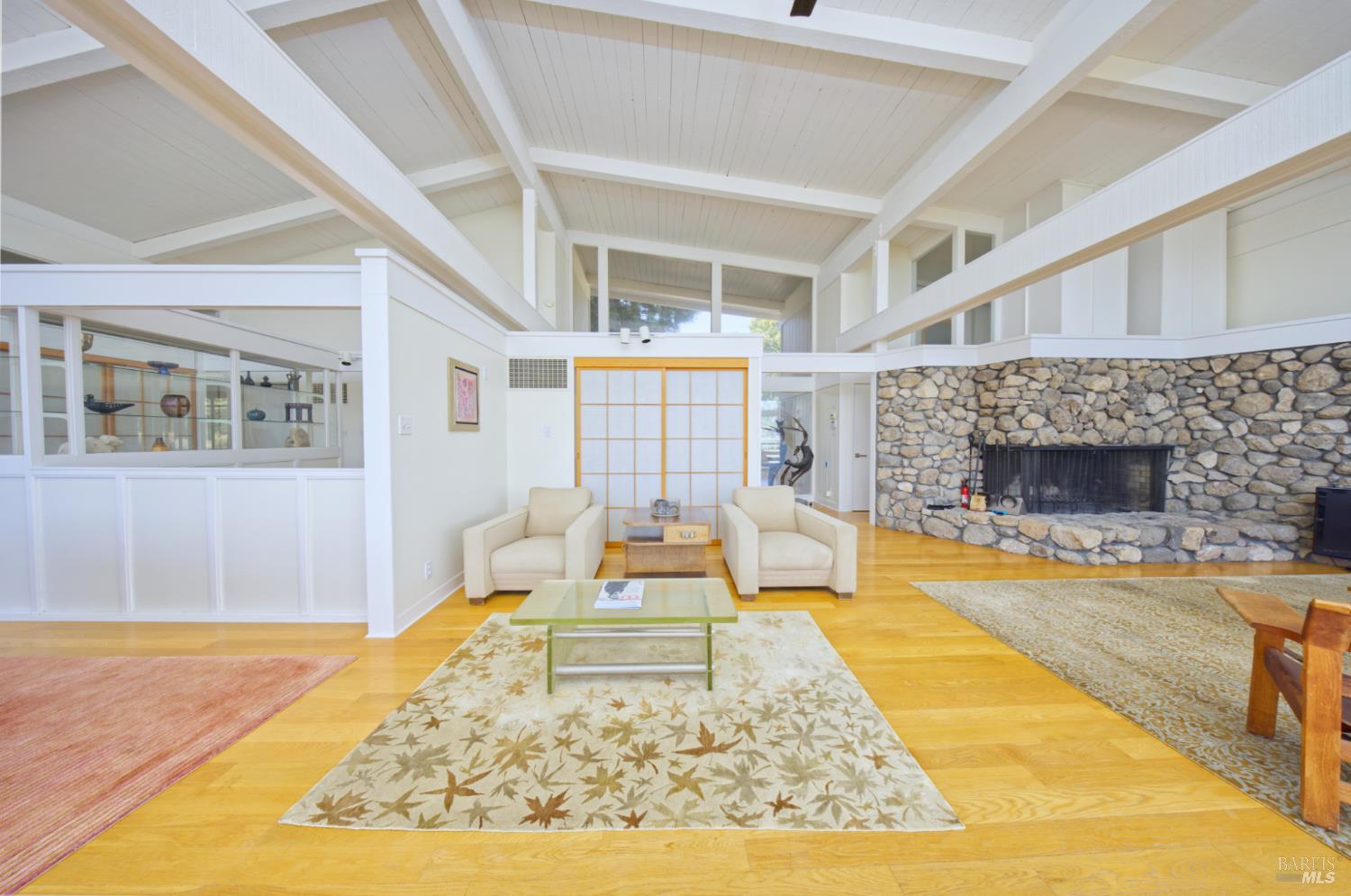 1755 Diamond Mountain Road Calistoga, CA 94515 - Photo 13 of 67 a living room with fireplace furniture and a fireplace