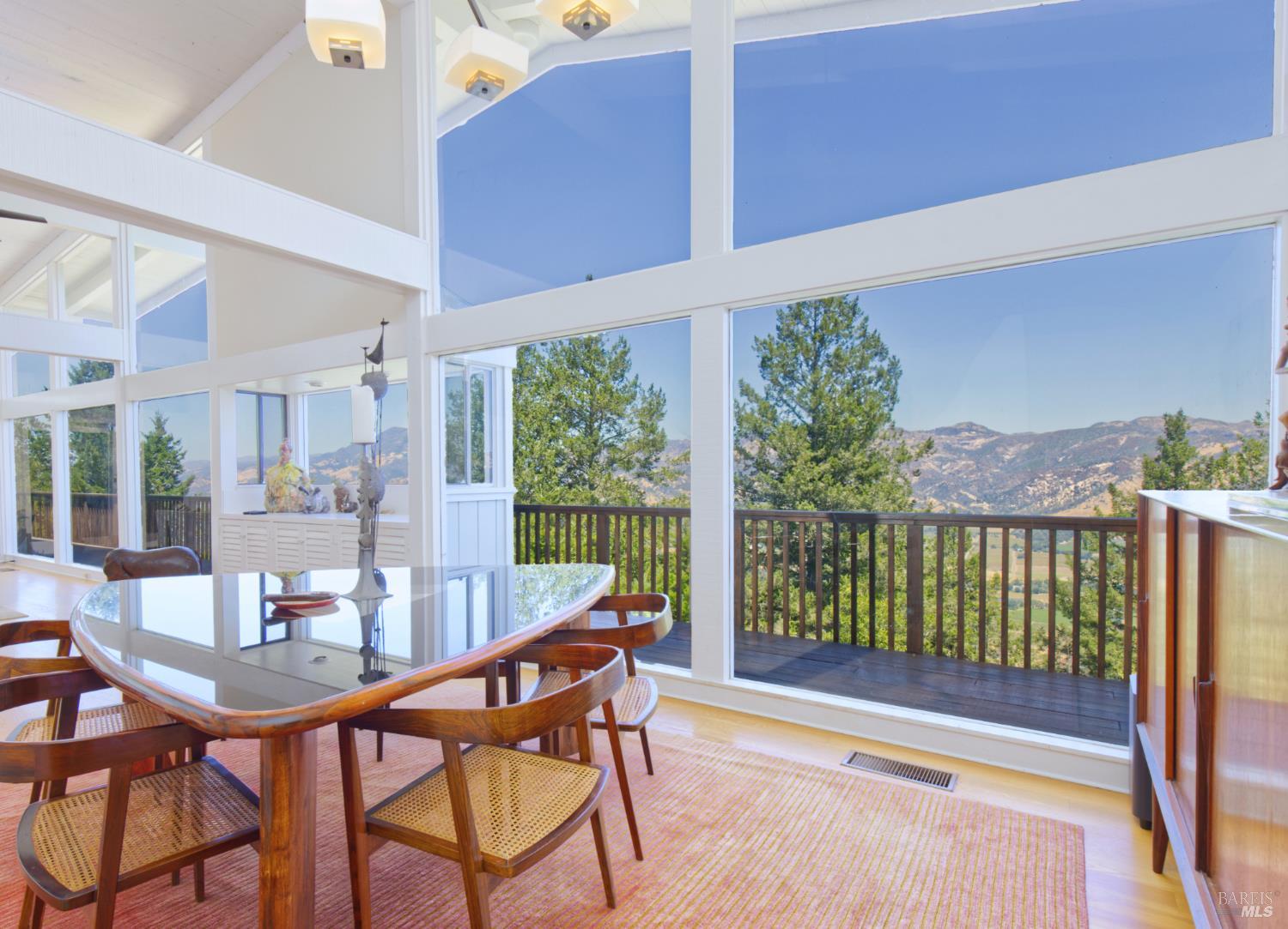 1755 Diamond Mountain Road Calistoga, CA 94515 - Photo 16 of 67 a view of a dining room with furniture window and outside view