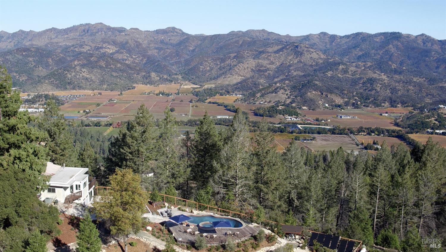 1755 Diamond Mountain Road Calistoga, CA 94515 - Photo 43 of 67 an aerial view of houses covered in trees