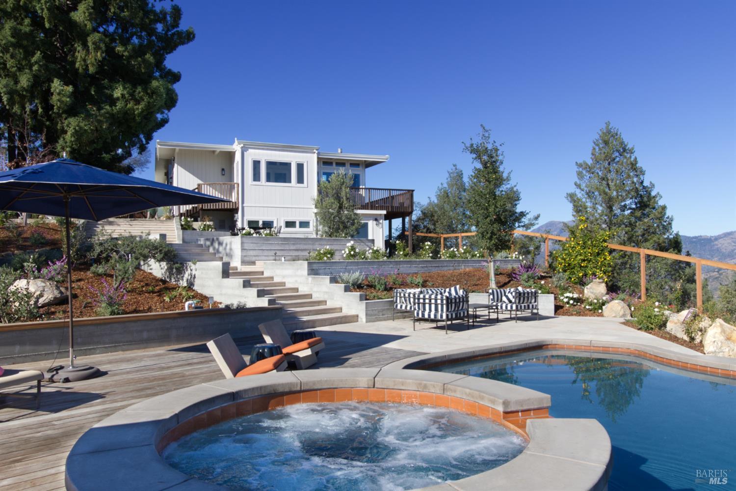 1755 Diamond Mountain Road Calistoga, CA 94515 - Photo 45 of 67 a view of a swimming pool with a patio